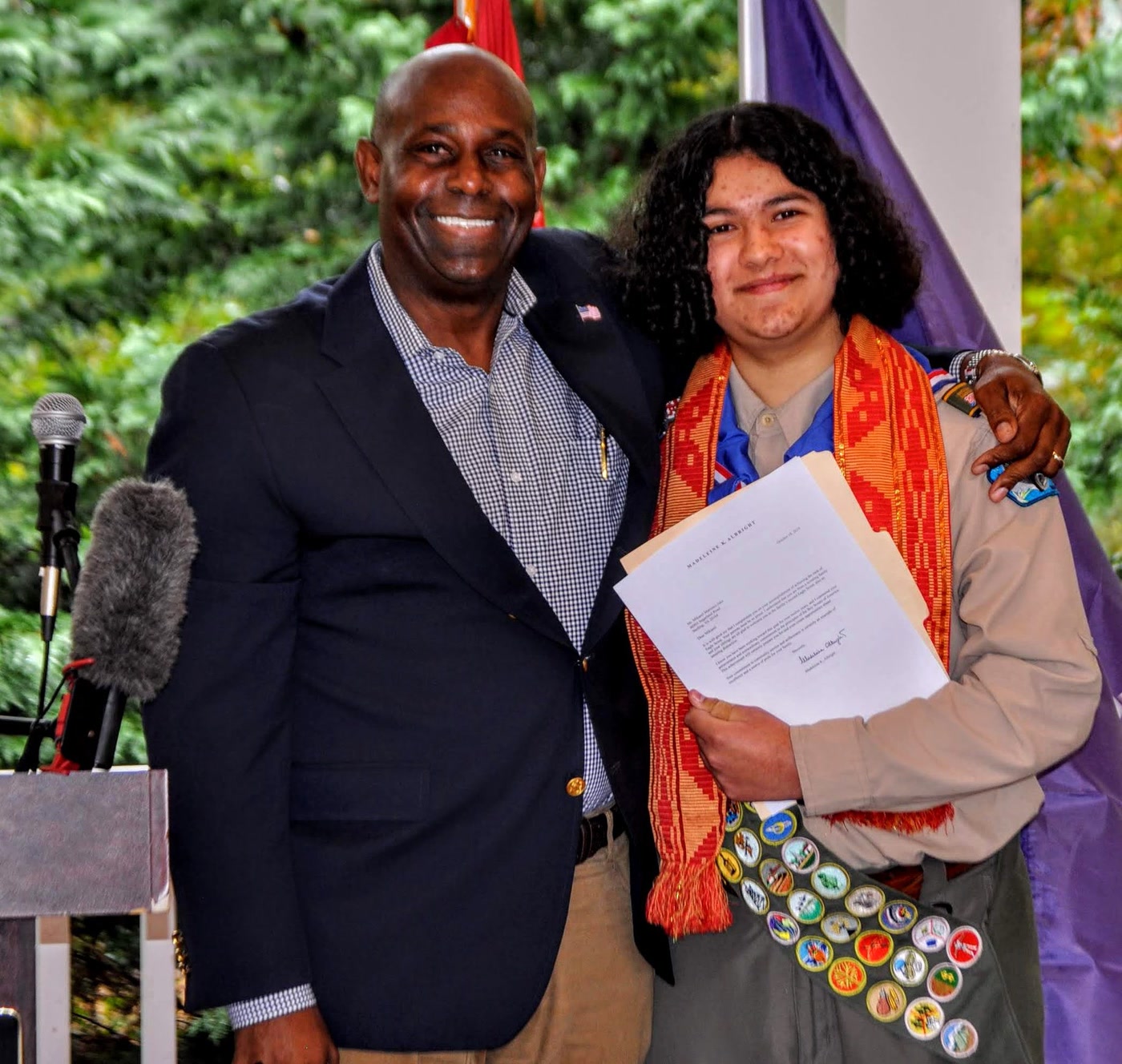 Forest Hayes congratulating a new Eagle Scout