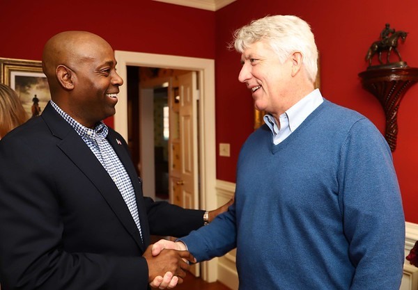 Forest Hayes shaking hands with Virginia Attorney General Mark Herring